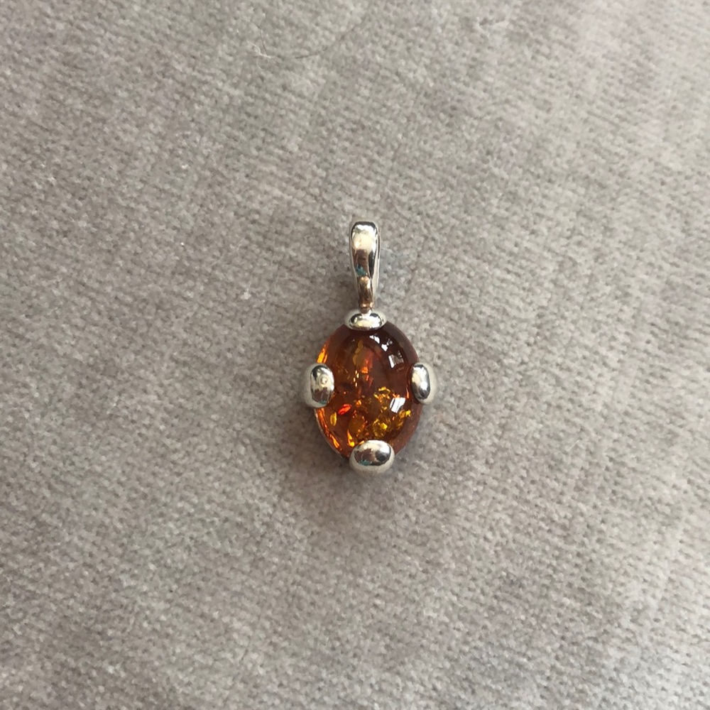 Amber and silver pendant